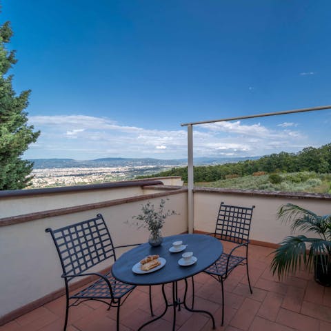 Take a moment for coffee and contemplation on the balcony