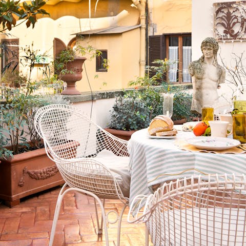 Sip red wine on the terrace as the sun sets