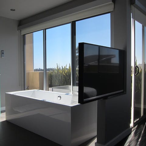 Watch the sunrise from the tub