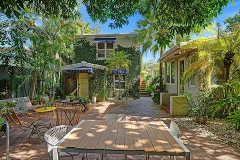 Dine alfresco under the tropical canopy in the shared garden