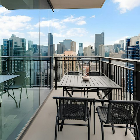 Relax on your private balcony with city views