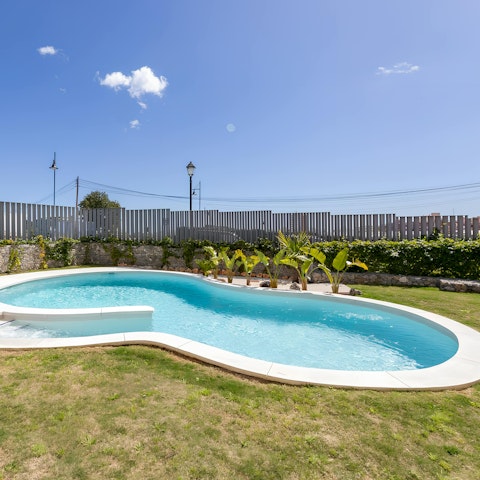 Head to the communal pool for a leisurely dip