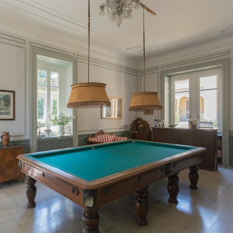 Gather for light hearted drinks and fun in the games room