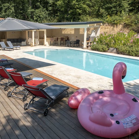 Jump into the home's swimming pool during the height of the afternoon heat