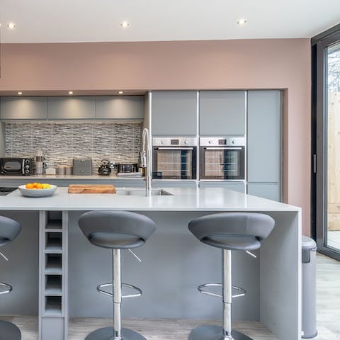 Channel your inner Jamie Oliver in the sleek kitchen, or hire a private chef to create a delicious dinner for you