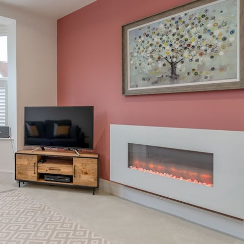 Unwind in the evenings in the sitting room, watching your favourite shows on the smart TV or playing a game on the Xbox