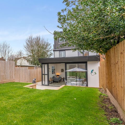 While away sunny afternoons in the private south-facing garden – there's an outdoor table for alfresco dining and a barbecue