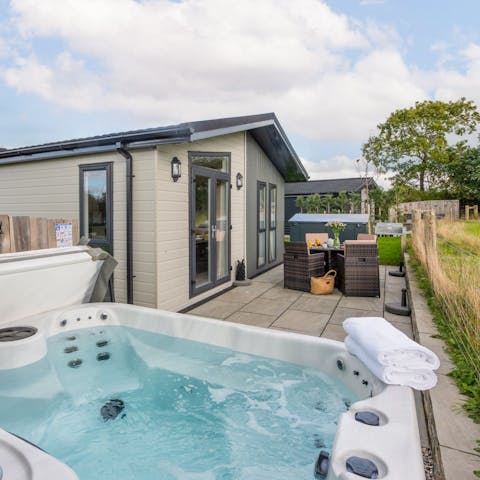 Make sundowners in the hot tub part of the new routine
