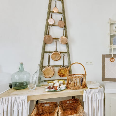This wooden tower for holding pots and pans in the kitchen
