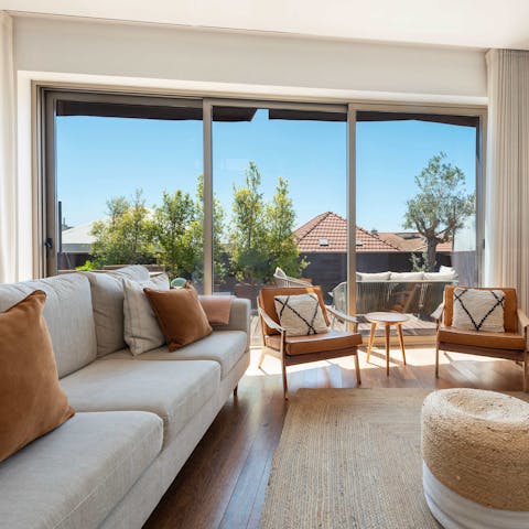Slide open the large glass door and let a cooling breeze circulate inside