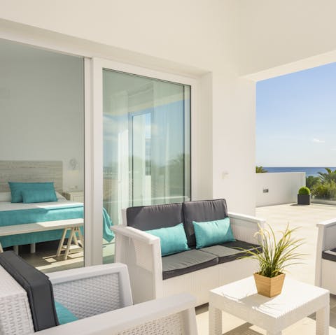 Catch the sunrise from the private terrace