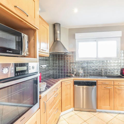 Make your favourite meals at home in the well-equipped kitchen