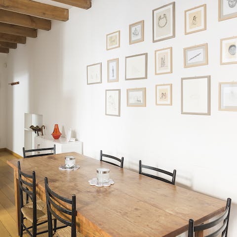 Sit down for a meal at the rustic dining table