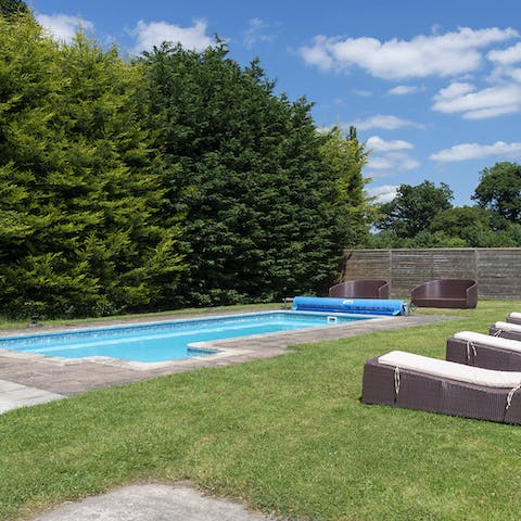 Spend sunny days on a lounger by the poolside