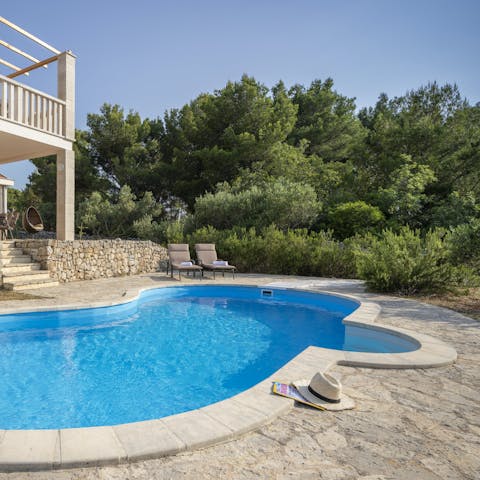 Enjoy pure relaxation while lounging by the pool