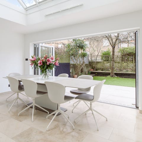 Open the doors to the garden and enjoy evening drinks at home