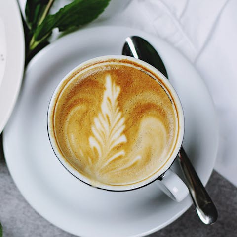 Experience the buzz of London in a local cafe