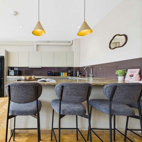 Sip your morning coffee while flicking through a newspaper at the breakfast bar