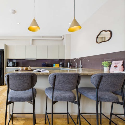 Sip your morning coffee while flicking through a newspaper at the breakfast bar