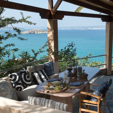 Have a toast with Ouzo on the terrace
