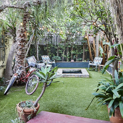 Kick back in the pretty shared garden of an evening