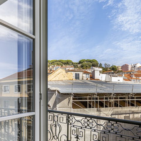 Wake up each morning and step onto the small balcony, admiring the views