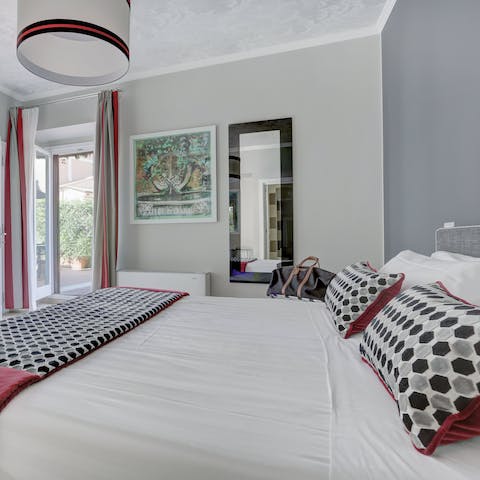 Wake up in your light-filled bedroom, the breeze washing over you