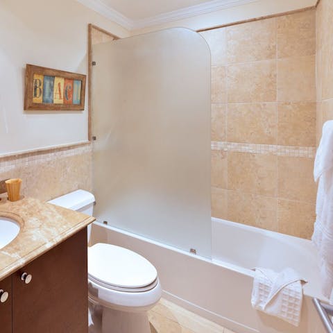 Close your eyes and sink back into piping hot water in the apartment's bathtub
