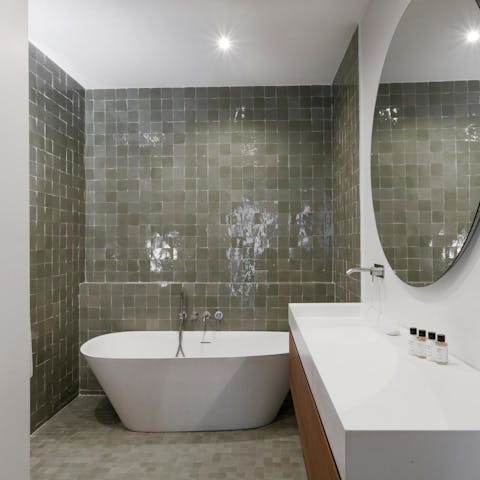 Slip into the en-suite bath and soak sore muscles