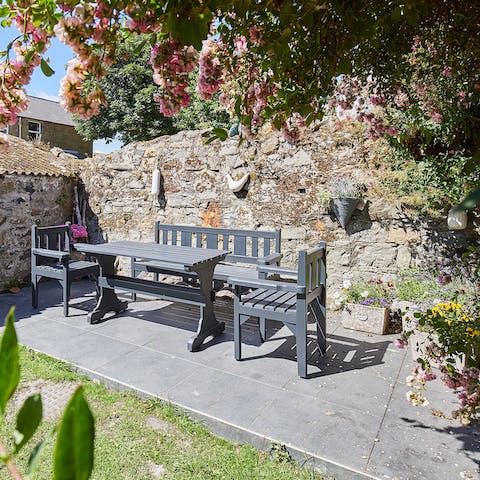 Savour morning coffees and birdsong from the pretty suntrap terrace