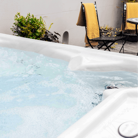 Unwind in the hot tub after a day out in the Somerset countryside