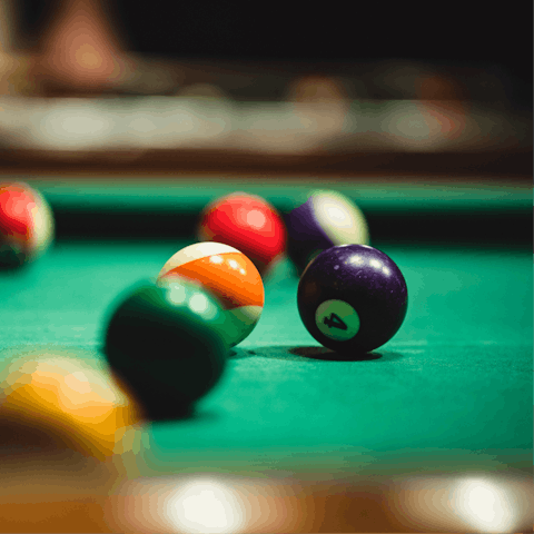 Head to the communal games room and play a game of pool, shuffleboard or chess