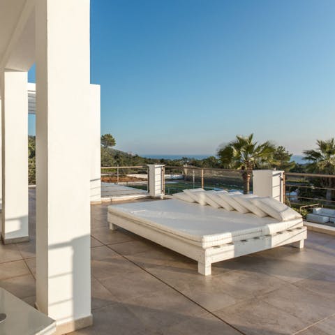 Find a comfy spot to read on the balcony