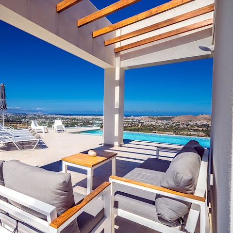 Settle down on the sun-drenched terrace with a good book