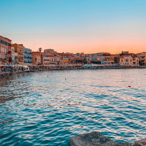 Explore the historic city of Chania, stopping off at a waterfront restaurant