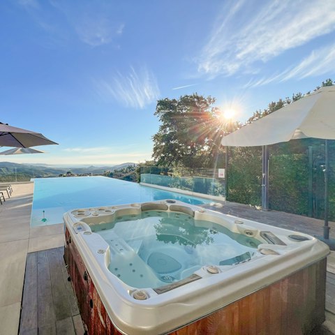 Unwind in the hot tub after a busy day exploring the coast