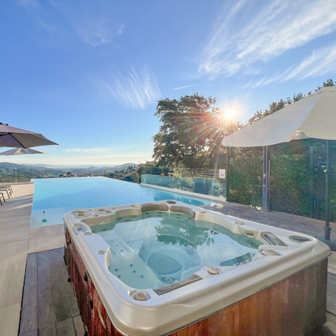 Unwind in the hot tub after a busy day exploring the coast