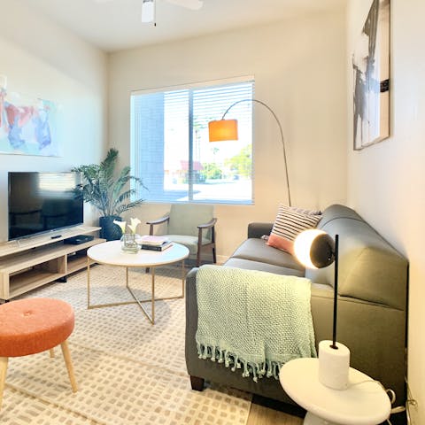 Curl up in the bright living space at the end of the day