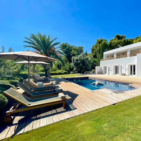Soak up the sun beside the swimming pool