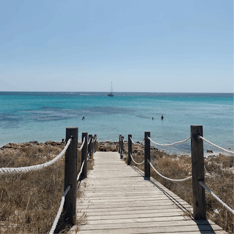 Drive fifteen minutes to Playa es Bol Nou