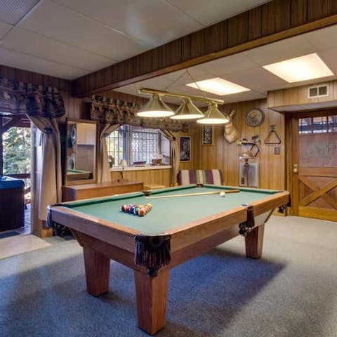 Play pool in the recreation room