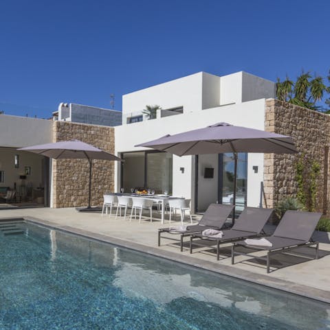 Go for a dip in the saltwater pool or relax in the hammocks