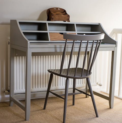 Work from home at this rustic desk or rent the nearby office space