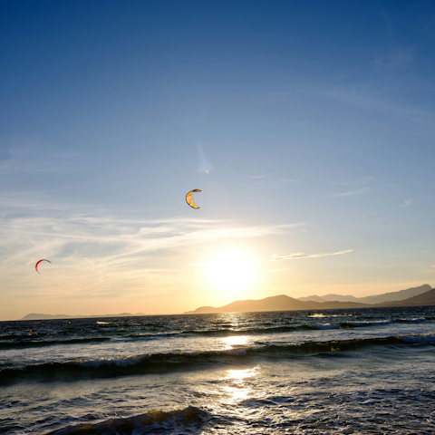 Practise watersports at Almanarre beach, ten-minute drive away