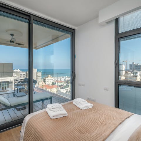 Wake up to sea views from the boutique-style bedroom