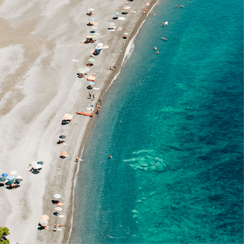 Sink your toes into the white sands of the Etruscan Coast — just a short drive from the villa