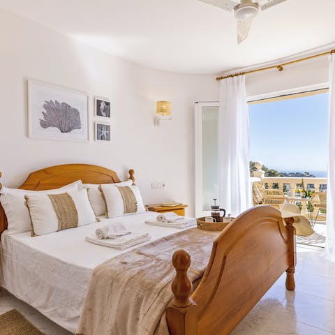 Wake up to coastal vistas each morning from the serene bedrooms