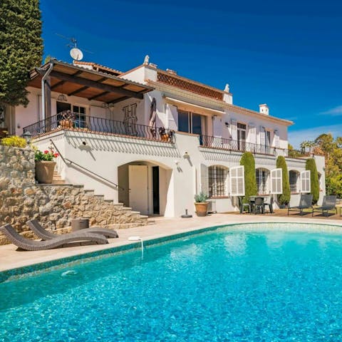 Soak up the sun beside the private pool