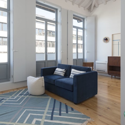 Kick off your shoes and snuggle up in the bright and comfy living room