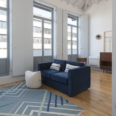 Kick off your shoes and snuggle up in the bright and comfy living room